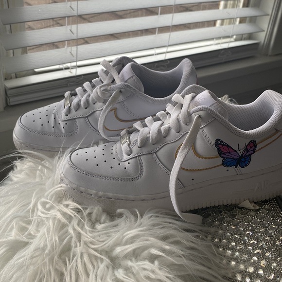 I have some Nike sneakers with butterflies on them so cute - Picture 2 of 4